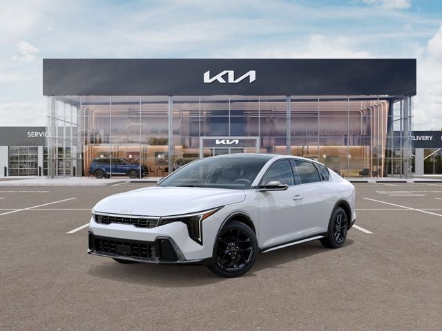 2026 Kia K4 GT-Line Turbo in Snow White Pearl — front three-quarter view