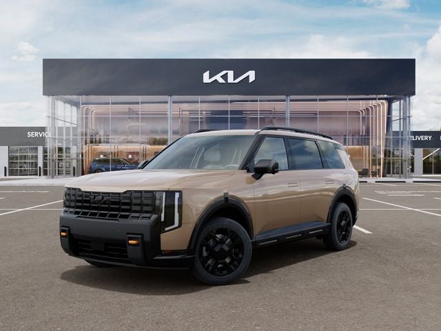 2027 Kia Telluride X-Pro SX in Terrain Brown — front three-quarter view